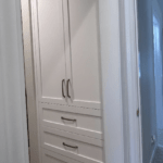 Linen Cabinet in Primary Bedroom Corridor